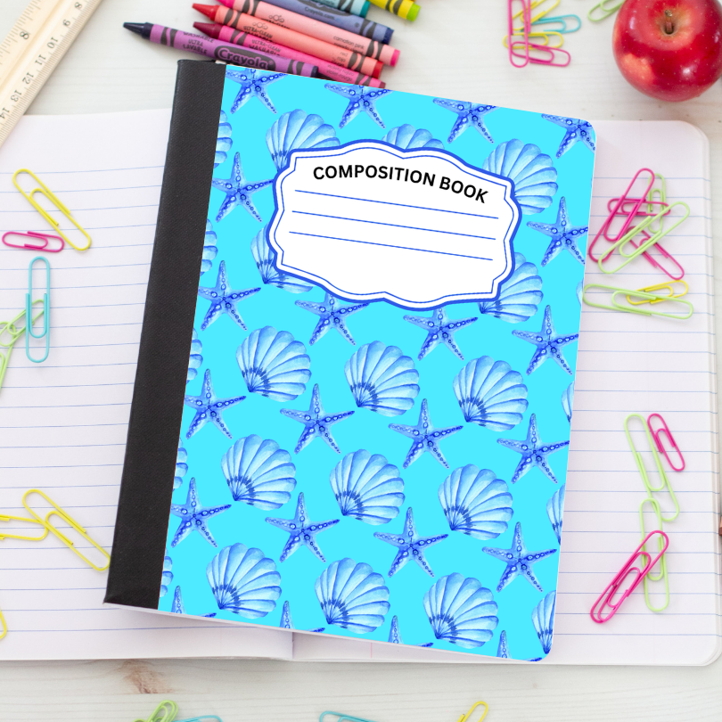 Blue composition notebook with starfish and clams 
